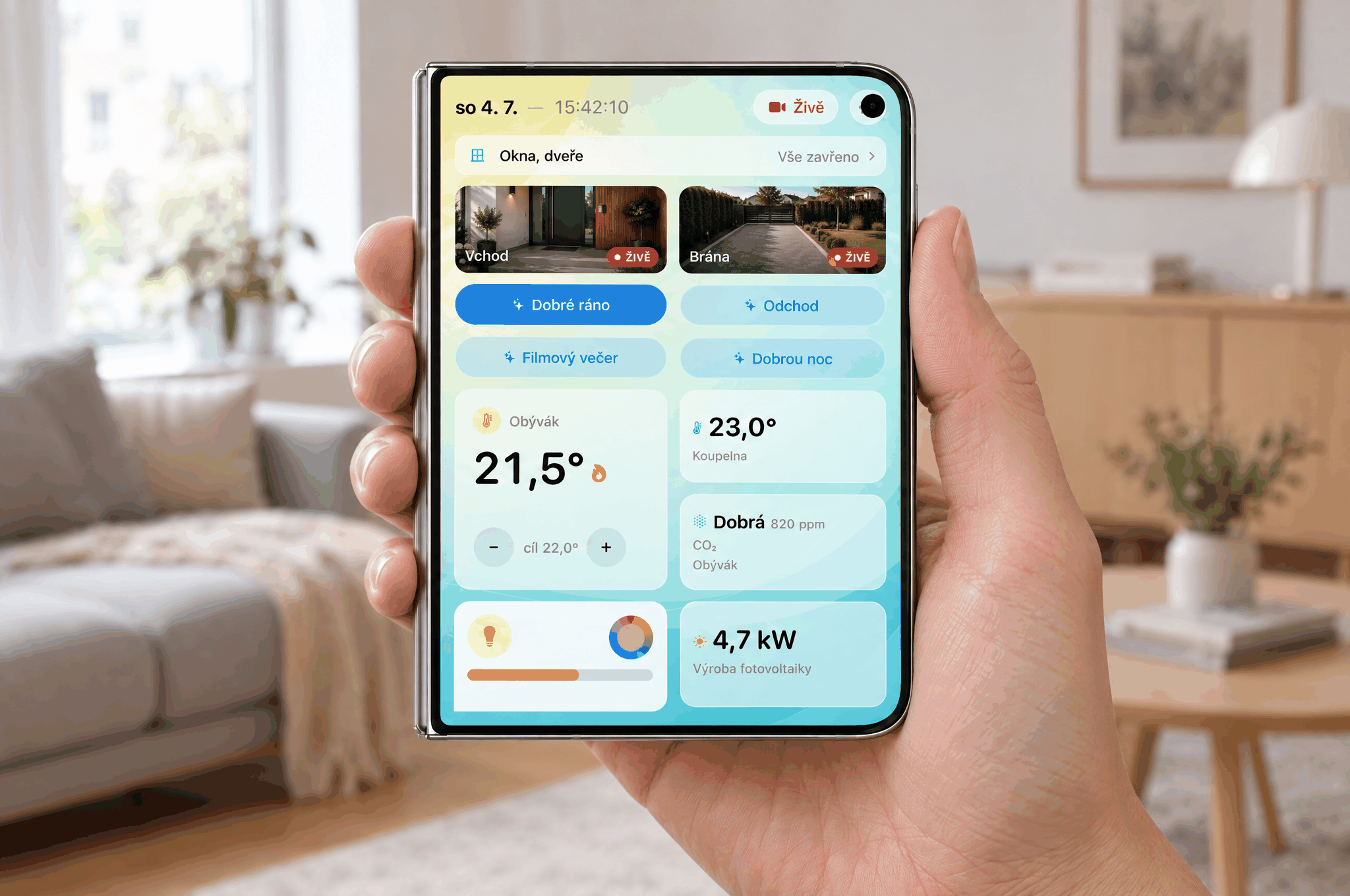 A folded foldable phone held in one hand, Dashboard on the cover screen